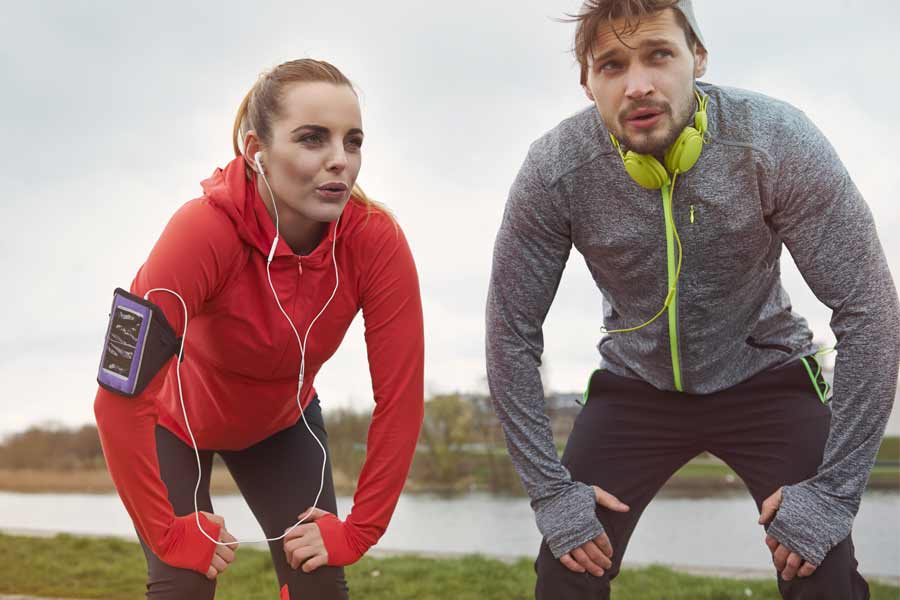 Man and Woman Running Rest