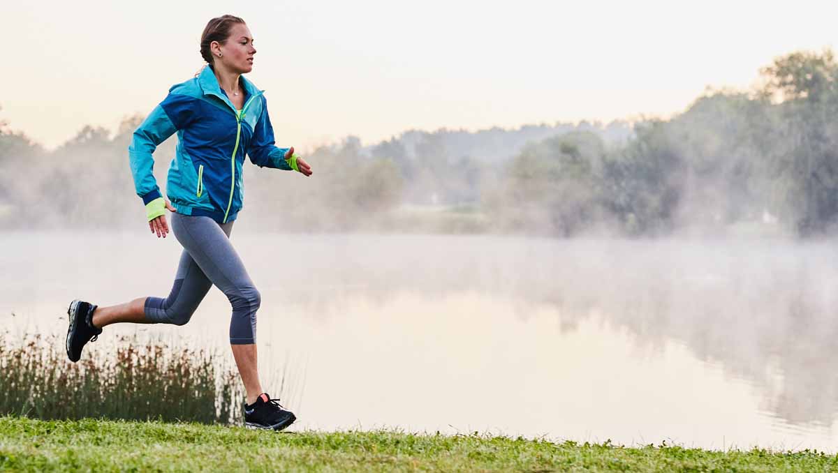 Woman Running In Nature