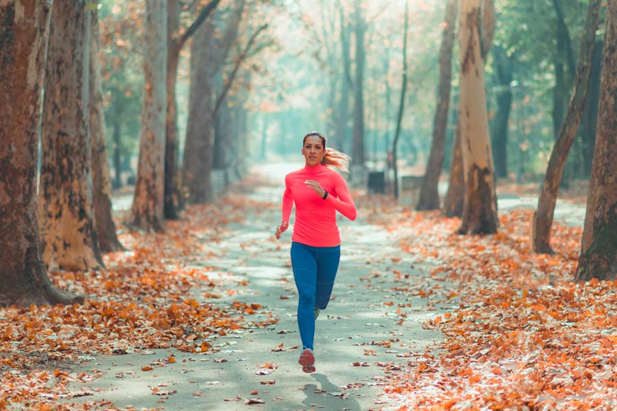 Woman Running in Park